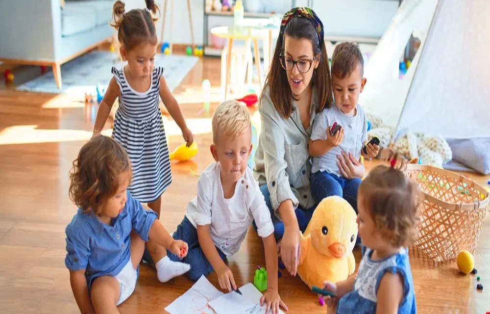 Who designs early childhood curricula at national levels?